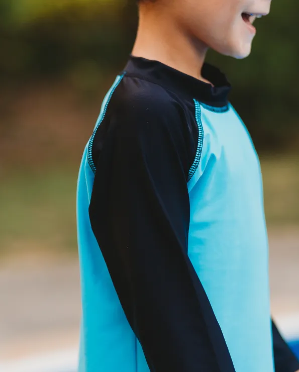 Boys UPF 50  Color Block Solid Long Sleeve Rashguard | Bright Light Blue with Black